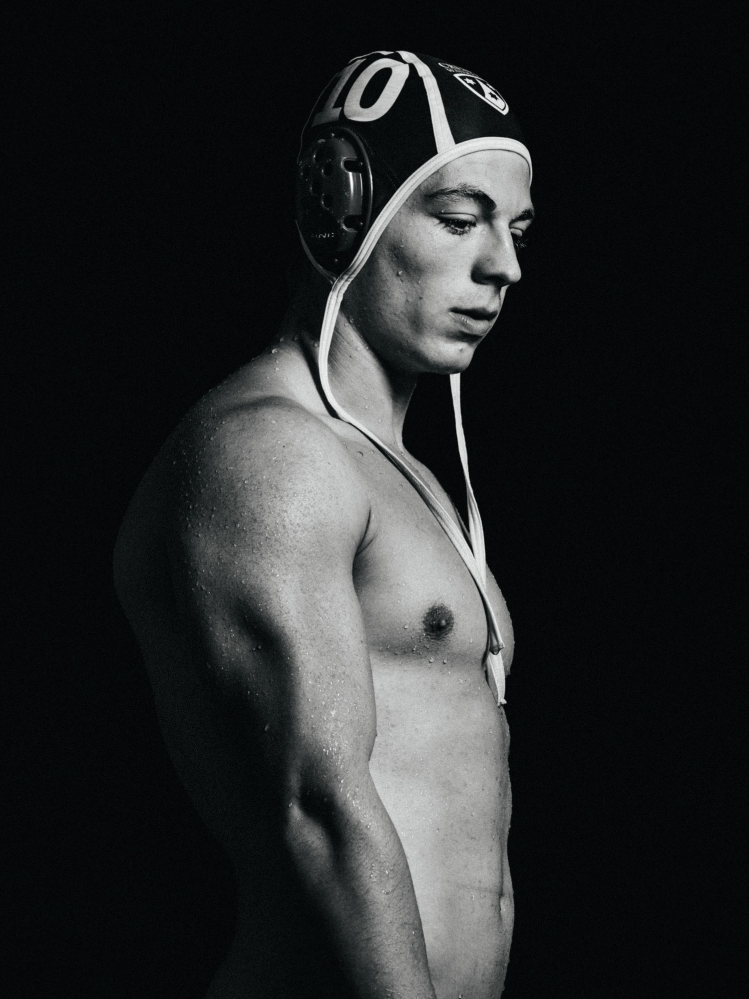 Black and white portrait of a young male water polo player